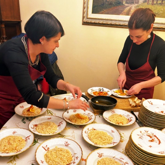 Barbara and Stephanie preparing tasty dishes together